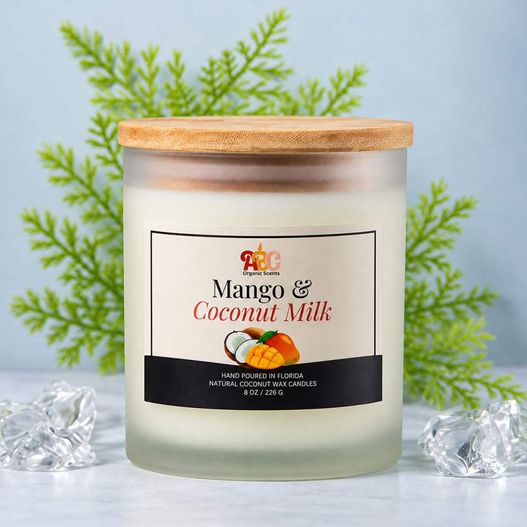 ABC Organic Scents Mango & Coconut Milk Candle in a glass jar with wooden lid